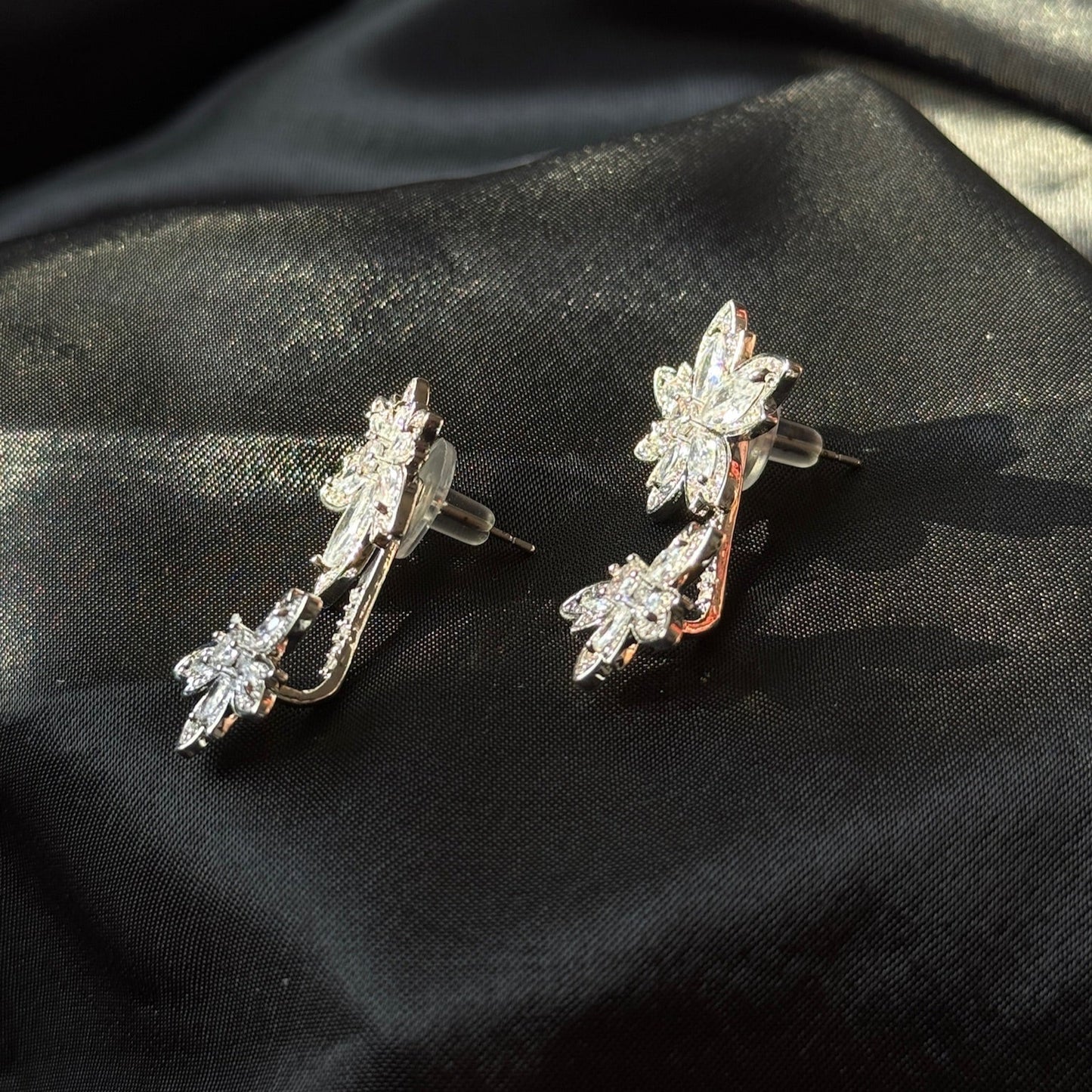 Whirpool Silver Flower Earrings