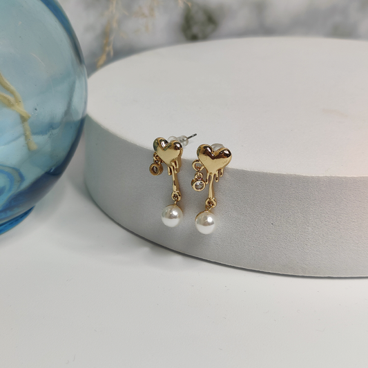 Sunlit pearl heart earrings
